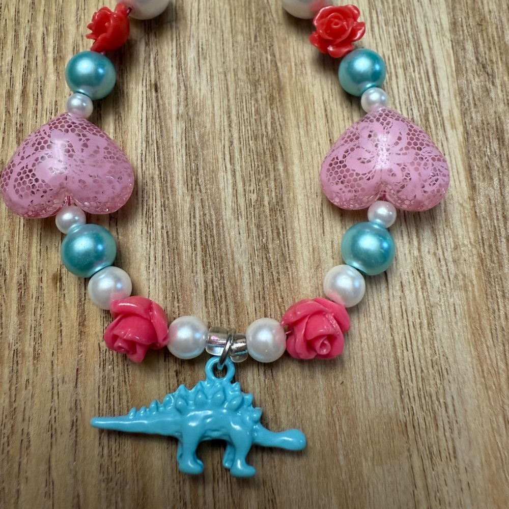 Whimsical Dinosaur Charm Bracelet with Pink and Blue Accents